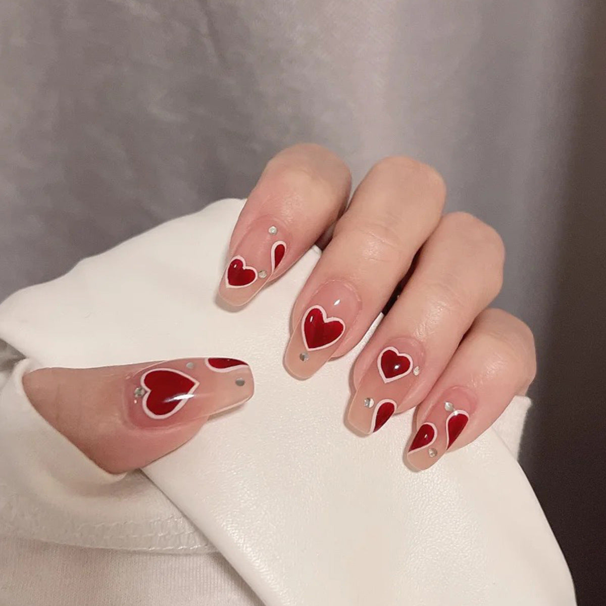 Pink hearts fake nail